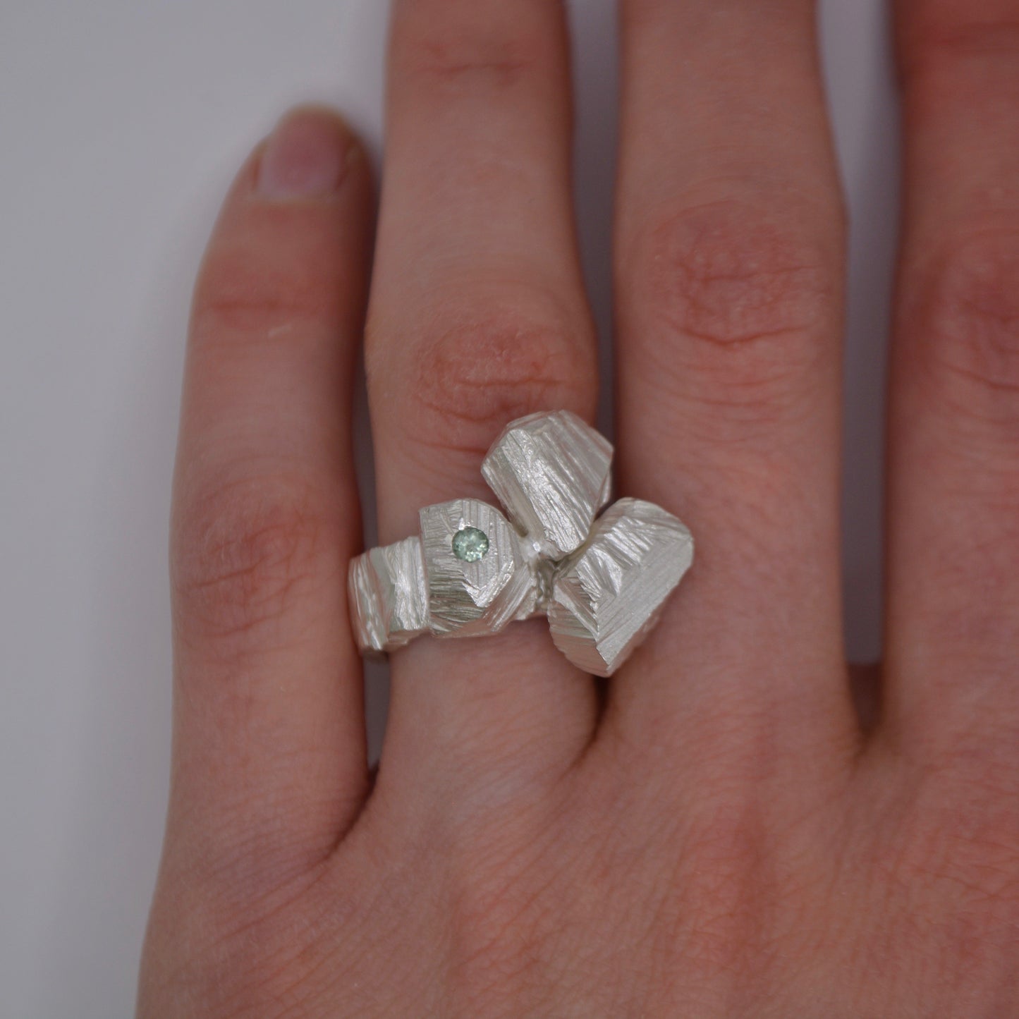 rock formation ring in sterling silver featuring a light green amethyst
