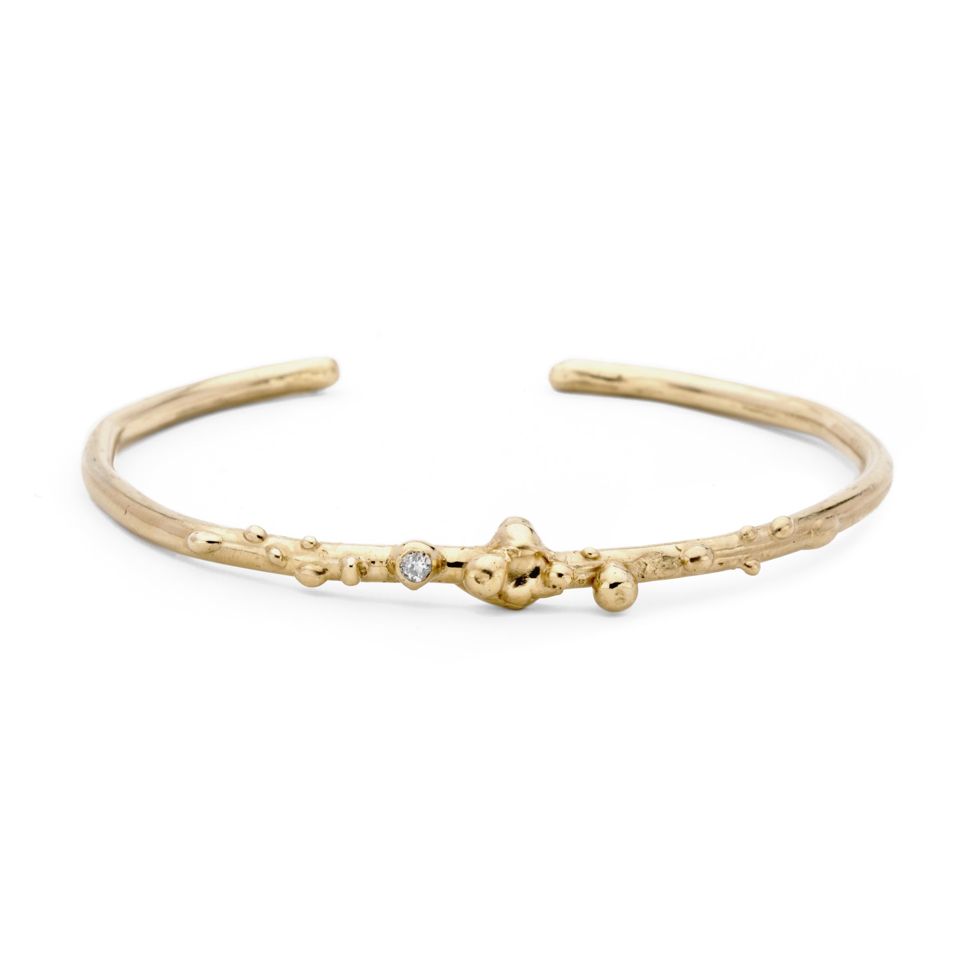 Yellow gold bangle with diamond