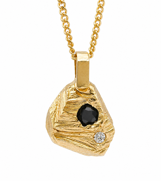 Textured Rock pendant with diamond and sapphire