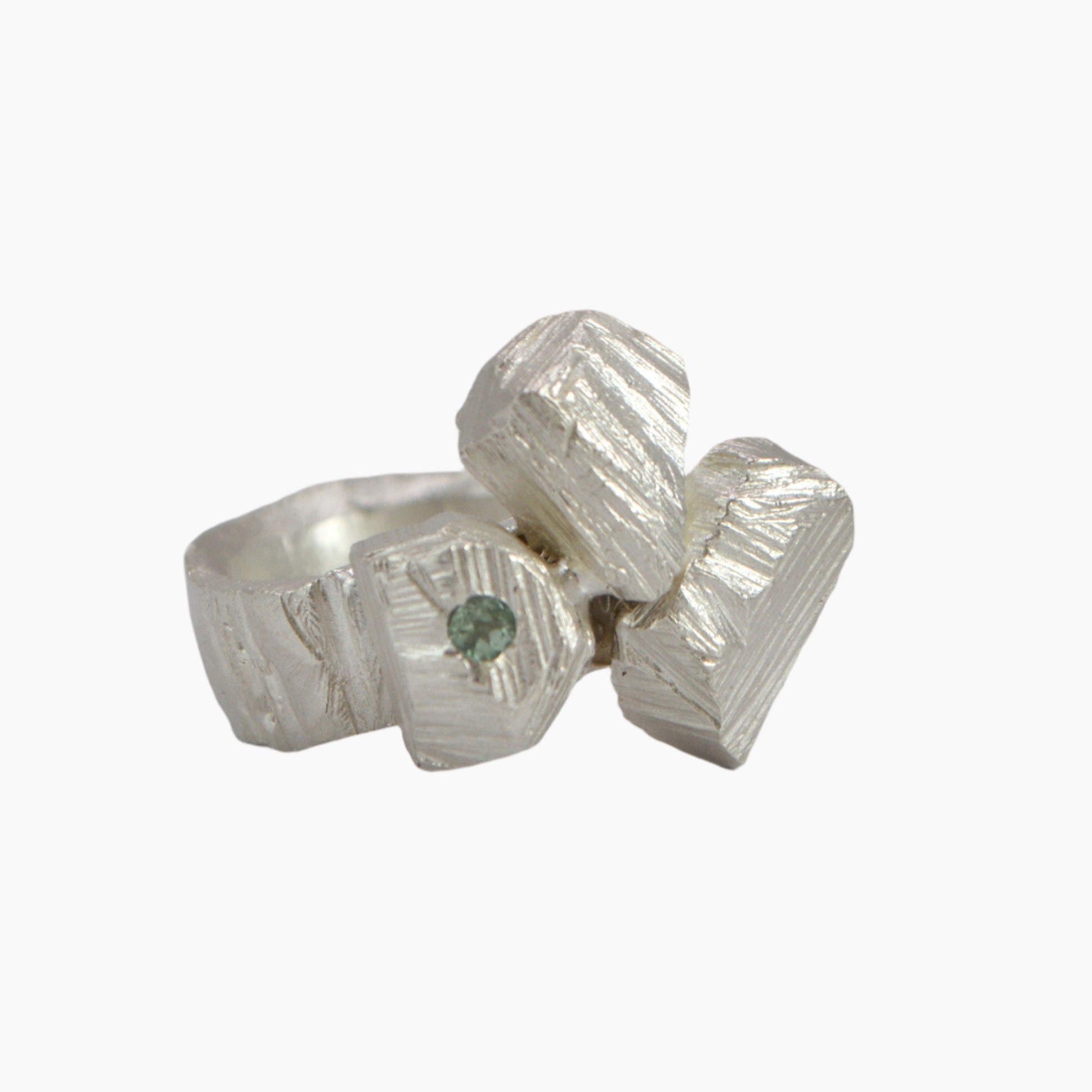 rock formation ring in sterling silver featuring a light green amethyst