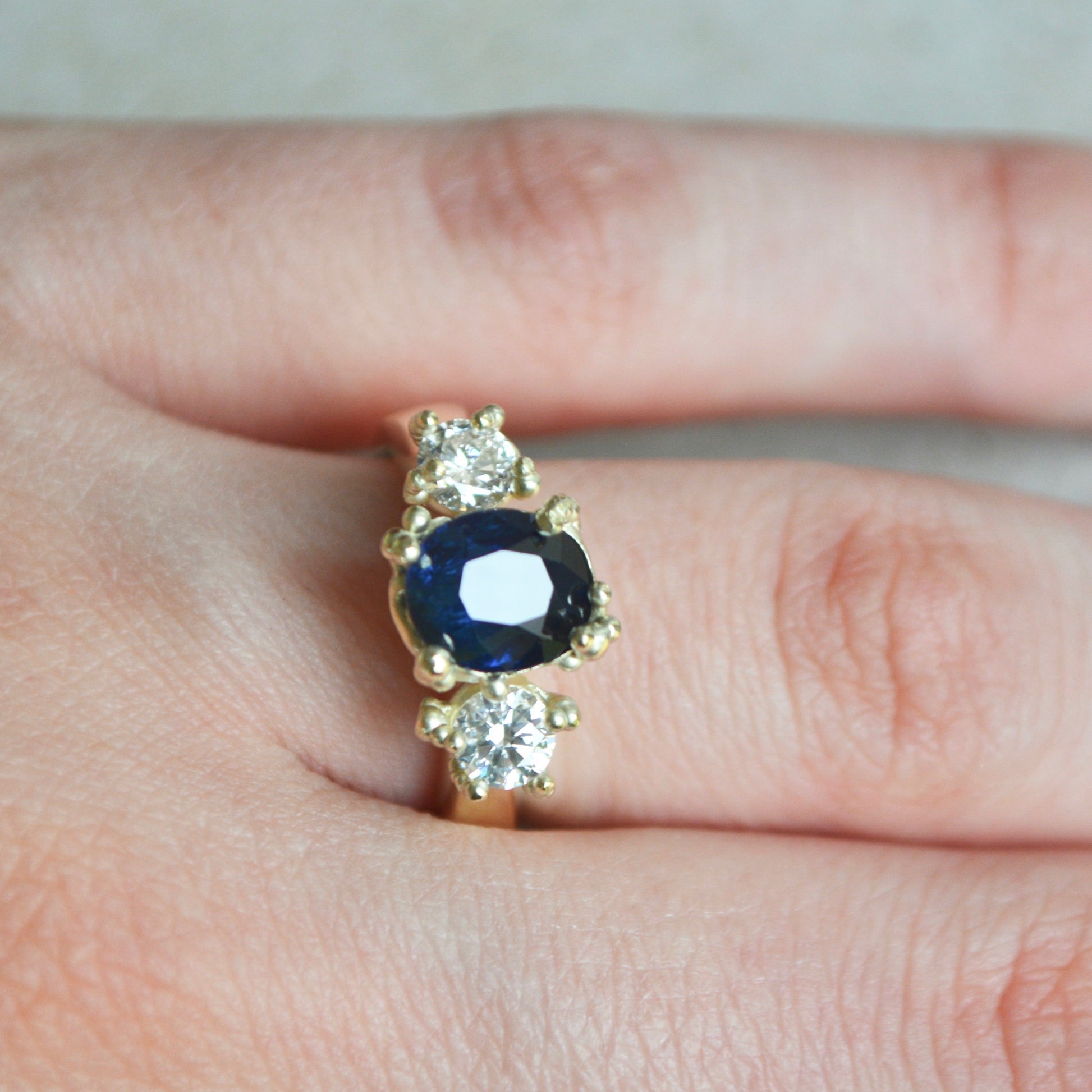 sapphire and diamond ring set in yellow gold
