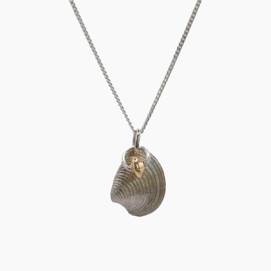 sterling silver pendant with yellow gold bead